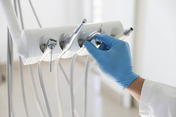 Professional Tooth Extraction technician working in Wolcottville, IN